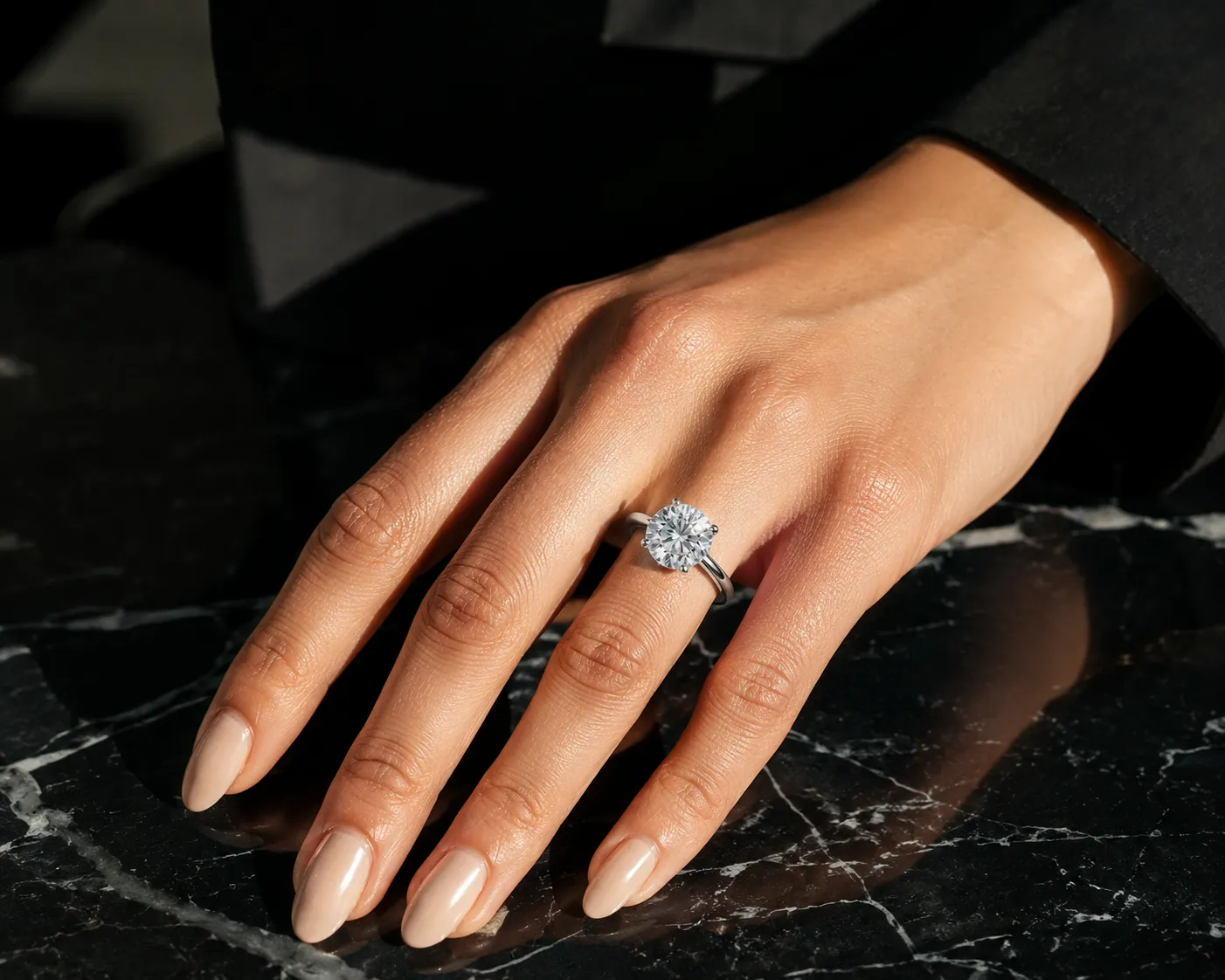 Hand wearing a lab-grown diamond ring from Nuralet fine jewellery